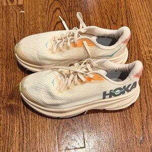 Hoka Cream and Orange Sneakers